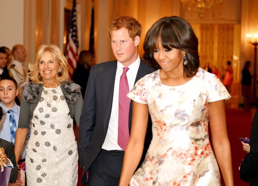 El príncipe Harry y Michelle Obama.