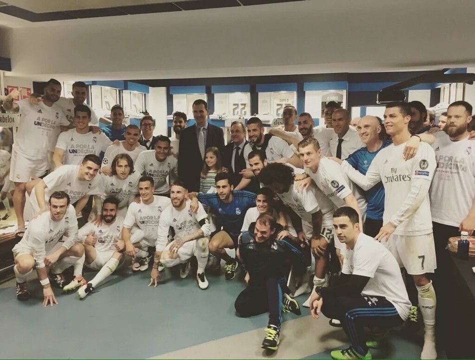 El rey y la infanta Sofía en la celebración con los jugadores del Real Madrid.