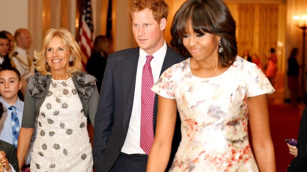 El príncipe Harry y Michelle Obama.
