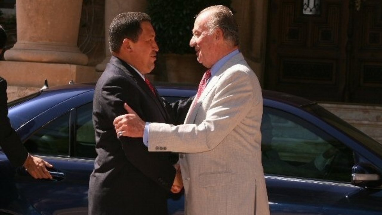 Hugo Chávez y Juan Carlos I.