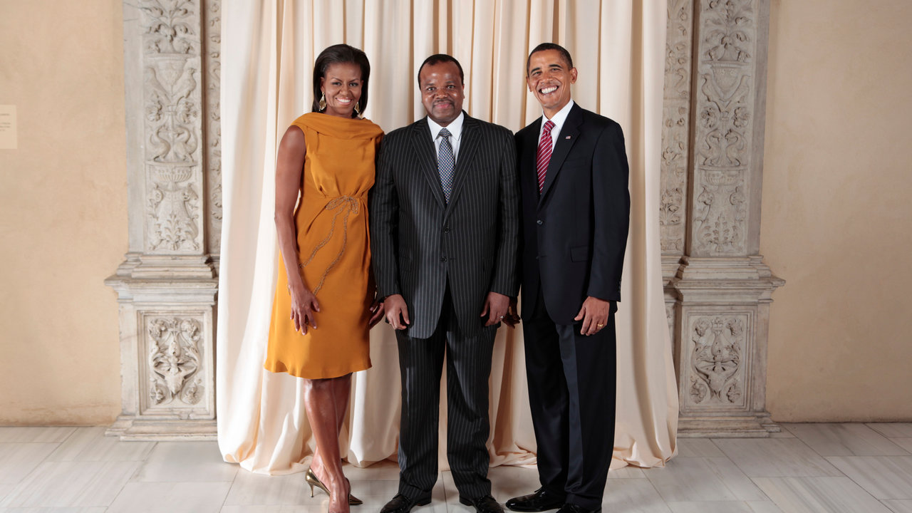 President Barack Obama and First Lady Michelle Obama pose for a photo during a reception at the Metropolitan Museum in New York with, His Majesty Mswati III King of the Kingdom Swaziland, Wednesday, Sept. 23, 2009. (Official White House Photo by Lawrence Jackson)



This official White House photograph is being made available only for publication by news organizations and/or for personal use printing by the subject(s) of the photograph. The photograph may not be manipulated in any way and may not be used in commercial or political materials, advertisements, emails, products, or promotions that in any way suggests approval or endorsement of the President, the First Family, or the White House. 