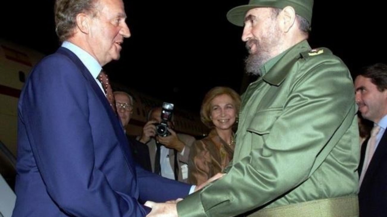Juan Carlos I y Fidel Castro.